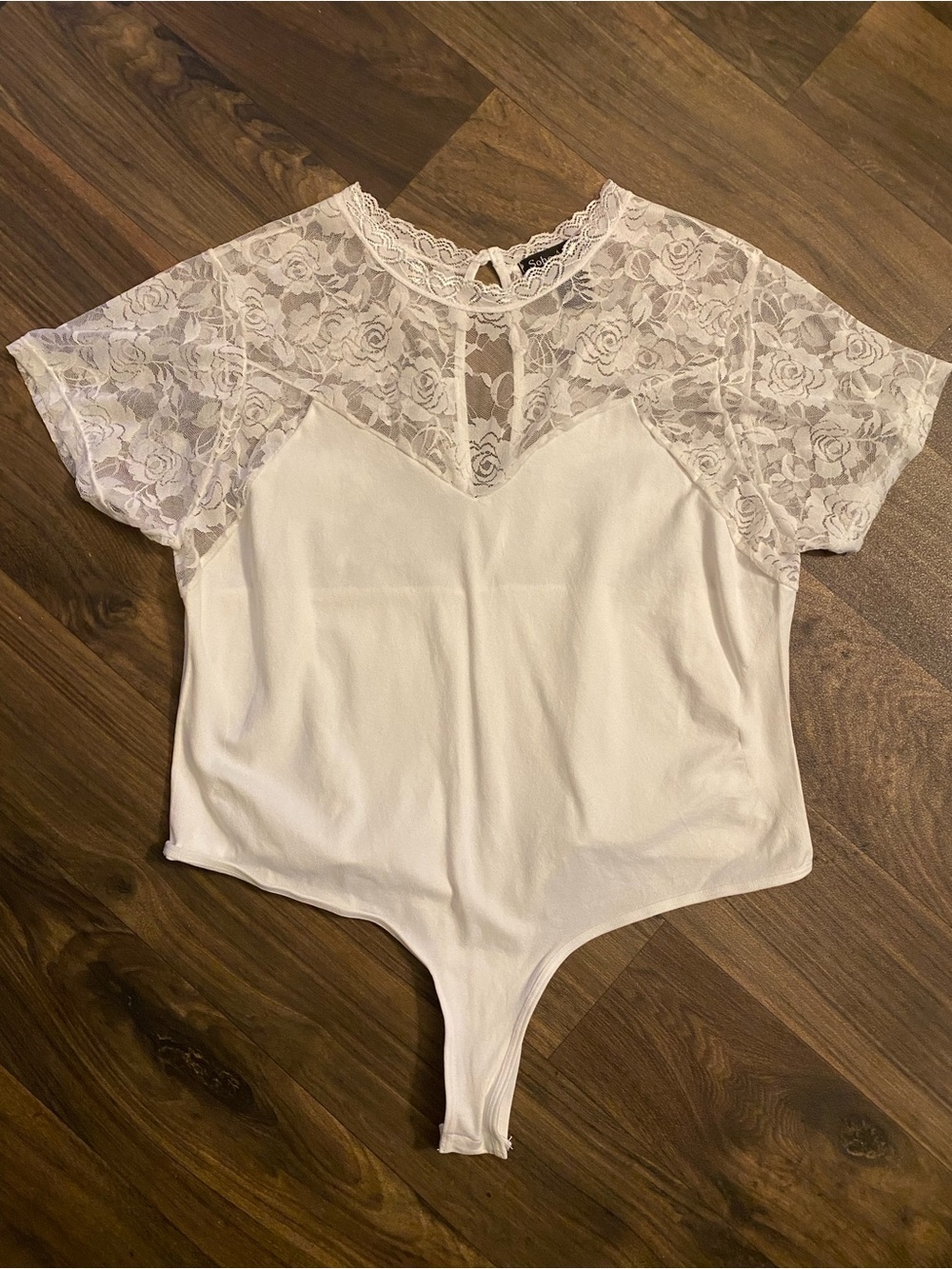 Soho Apparel White Lace Short Sleeve Bodysuit with Keyhole Tie